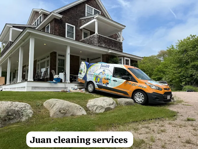 Juan Cleaning Services van at a client home